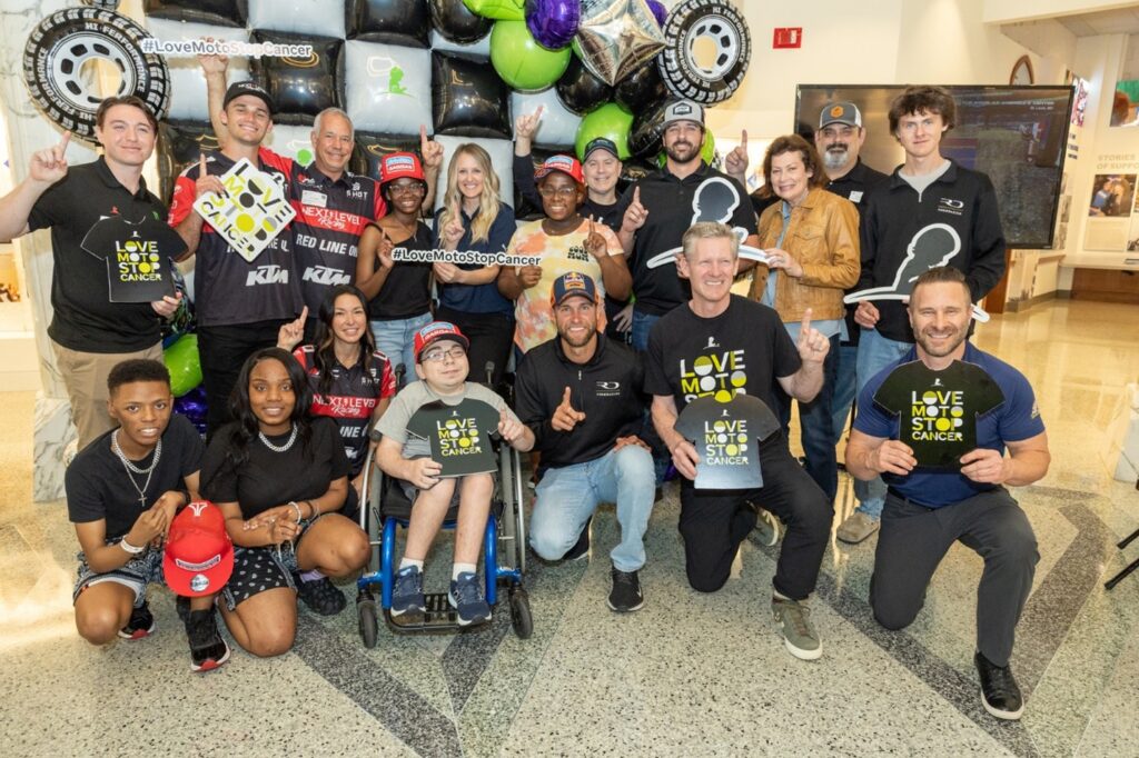 Supercross athletes, team members, and partners on the campus of St. Jude Children’s Research Hospital during a recent visit and Love Moto Stop Cancer patient reception. Photo Courtesy of St. Jude Children’s Research Hospital