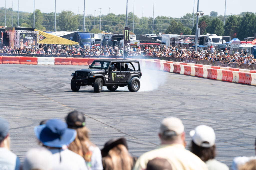 Monster Energy vehicle performing for fans